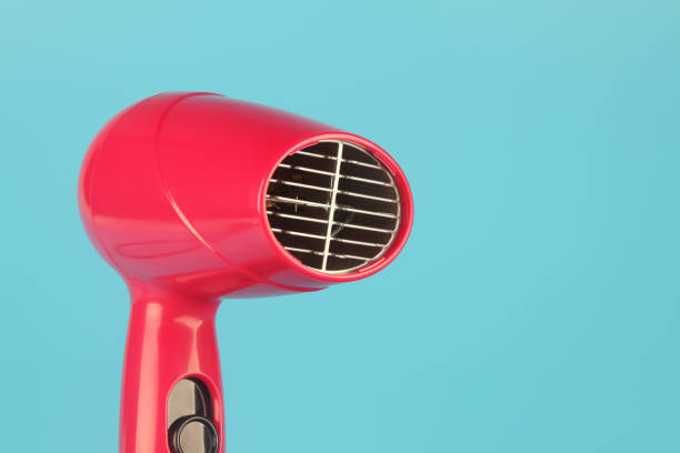 идиан сделал новый фен. парикмахерские принадлежности - hair dryer single object plastic black стоковые фото и изображения