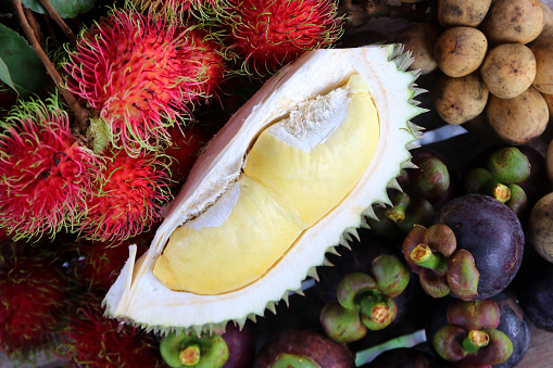 famous Thai fruit, durian mangosteen and rambutan on wooden table