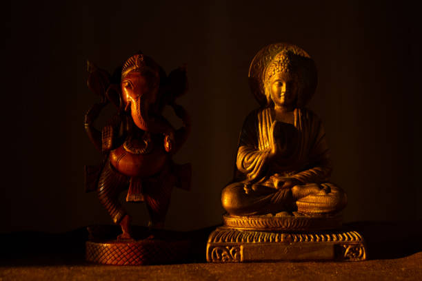 istock Buddha and ganesha figurines 1249515997