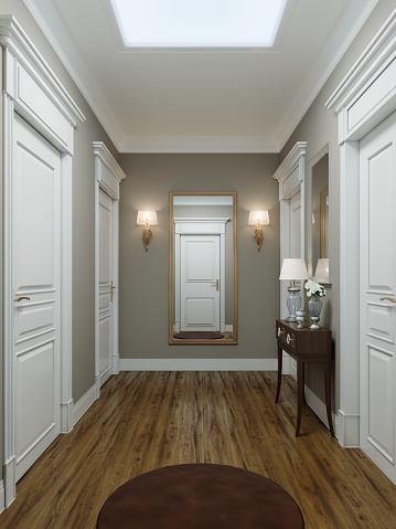 Classic modern hallway corridor interior with beige walls and white doors. Key table and a large mirror with sconces on the wall. 3D rendering.
