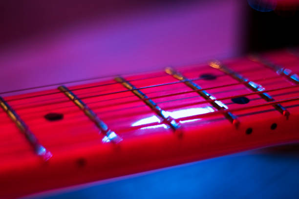 istock Guitar instrument close-up and macro, led red light and object. 1249527126