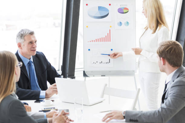 istock Businesswoman giving presentation 1249527390