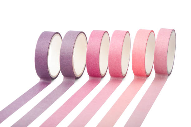 istock Adhesive tape rolls and parallel strips isolated on white background 1249528590