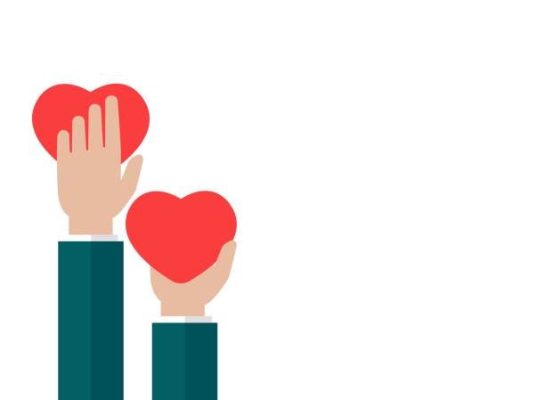 istock Hands holding red heart on white background. charity, philanthropy, support, giving 1249528691