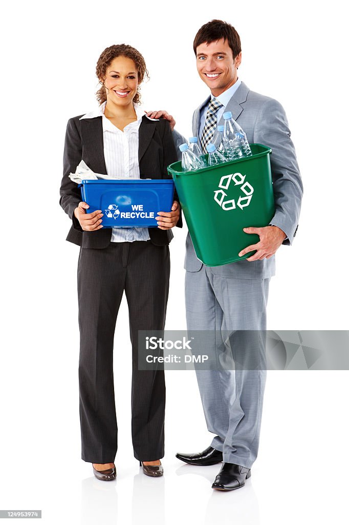 Business People Recycling - Isolated Businesswoman and businessman stand with recycling bins in their arms. Vertical shot. Isolated on white. Recycling Bin Stock Photo