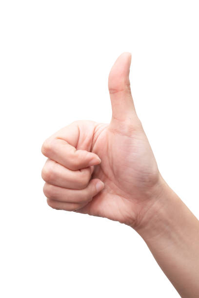 istock Woman's hand showing thumbs up gesture. Hand sign concept. 1249544121