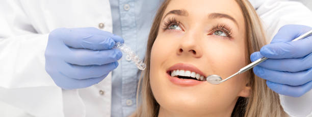 istock Woman having teeth examined at dentists 1249544563