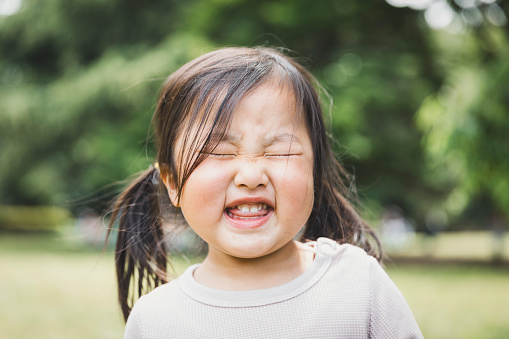 Asian baby girl playing in the park.