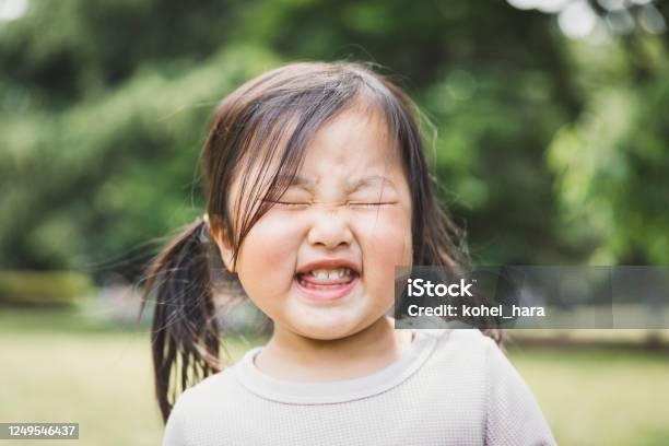 Portrait Of Girl In The Park Stock Photo - Download Image Now - Child, Japanese Ethnicity, Childhood