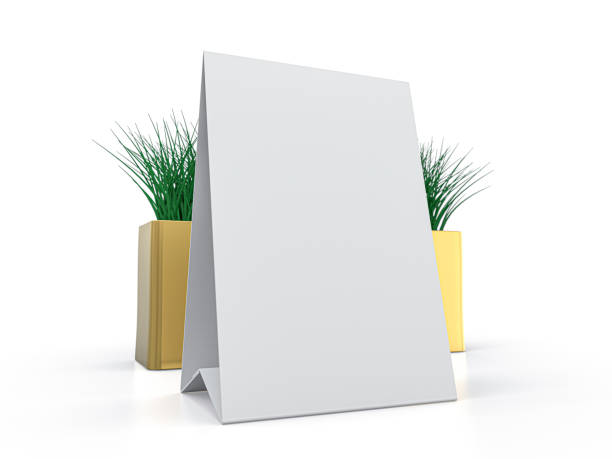 istock Blank paper Table Tent. Mockup on white background. 3D illustration. 1249550779