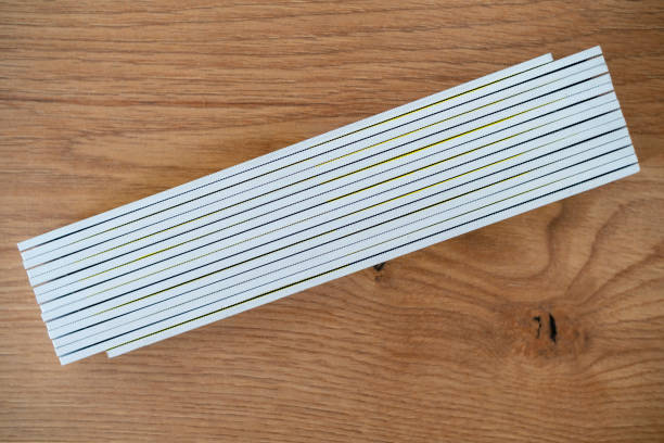 folding ruler on new wooden floor - folding ruler imagens e fotografias de stock