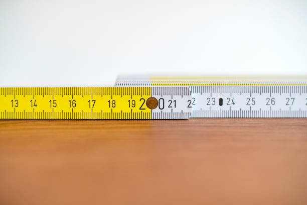 istock Folding ruler on new wooden floor 1249551400