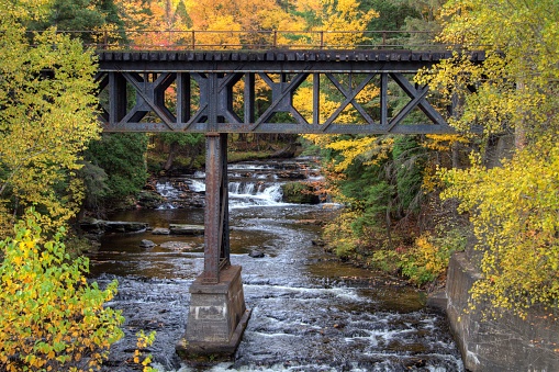 Train Bridge And Autumn Waterfall In Baraga County Michigan