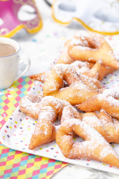 Traditional Bugnes Lyonnaises beignets served for Mardi Gras - Photo