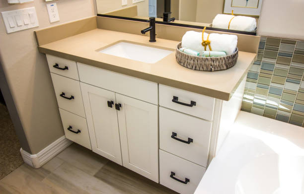 モダンなバスルームの洗面化粧台とキャビネット - bathroom cabinet door drawer ストックフォトと画像