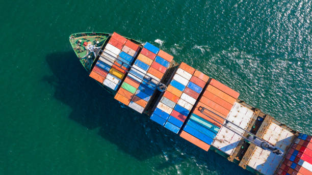 istock Aerial view container cargo ship in ocean, Business industry commerce global import export logistic transportation oversea worldwide, Sea shipping company vessel. 1249555472