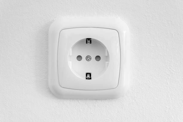 New outlet on the white wall close-up