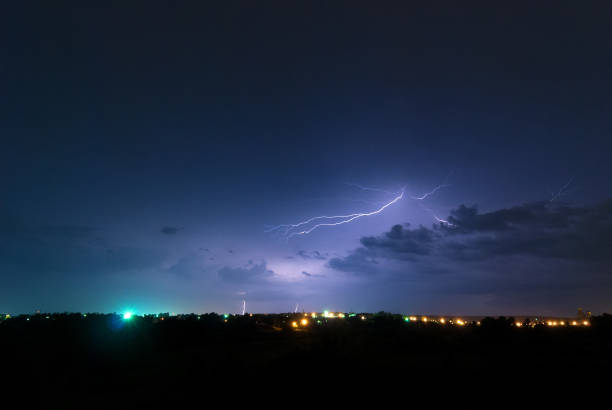 istock Lightning bolt in the clouds over the countryside 1249558232