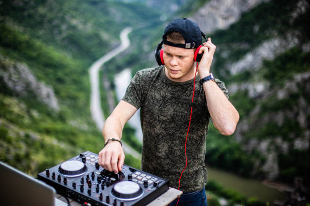 istock Dj playing music in nature 1249560972