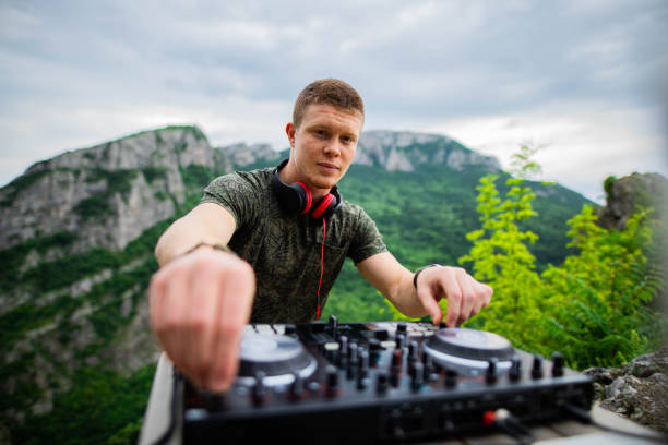 istock Dj playing music in nature 1249560989