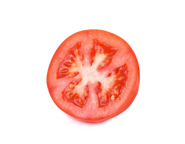 istock Slice of tomato isolated on white 1249565326