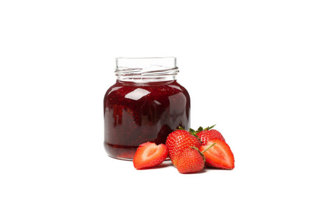 istock Delicious strawberry jam isolated on white background 1249568162