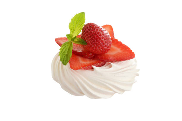 isolated strawberry meringue nest with mint on a white background