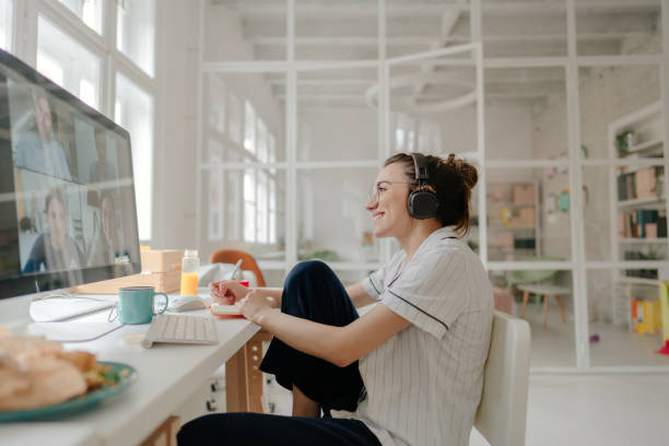 istock Smiling woman working from home 1249572044