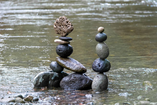 istock Balancing stones, nature art in a clean river 1249572186