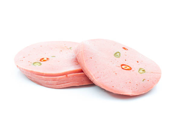 istock Fresh sausages on white background. 1249576620