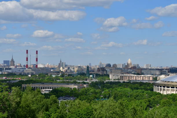 istock Moscow urban skyline on a sunny day with blue sky and white clouds 1249577509