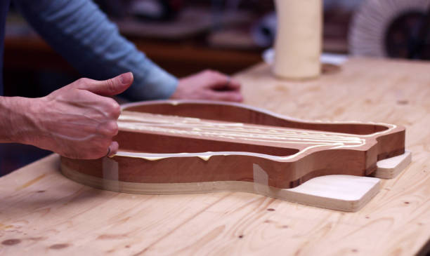 istock Glueing wood with finger 1249577934