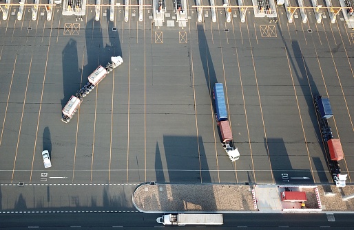 Aerial view of trucks with shipping containers