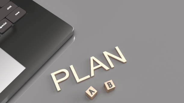 istock The plan word and a b wood cube for symbol  choose  3d rendering image. 1249579465