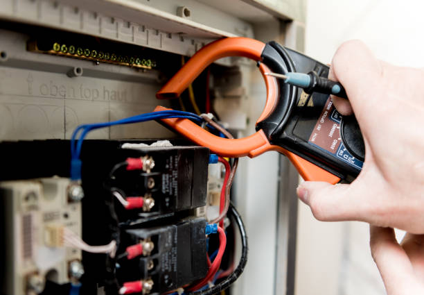 istock The man is repairing the switchboard voltage with automatic switches. 1249580747
