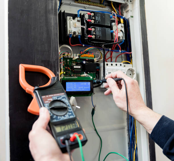 istock The man is repairing the switchboard voltage with automatic switches. 1249581515