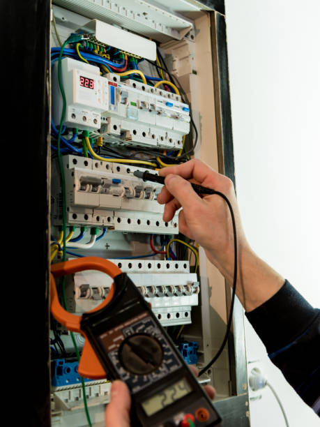 istock The man is repairing the switchboard voltage with automatic switches. 1249581603