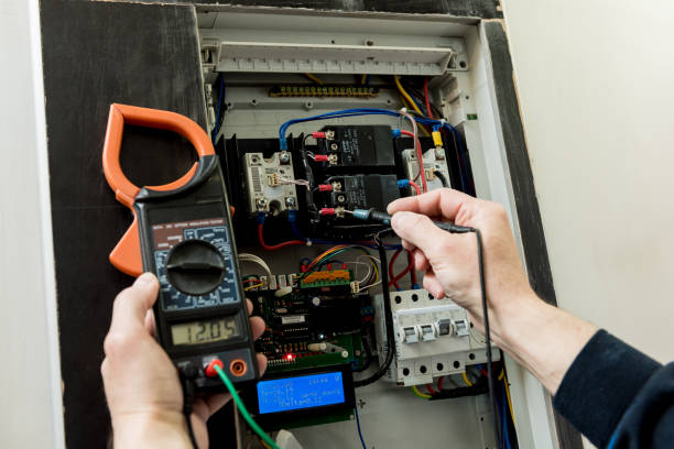 istock The man is repairing the switchboard voltage with automatic switches. 1249581834