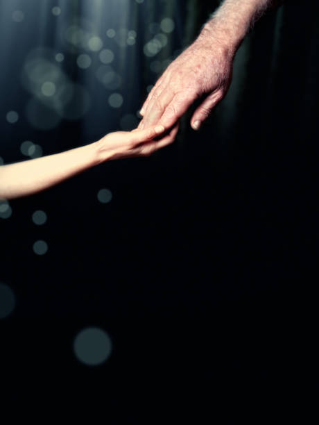 istock solidarity concept of hands reaching each other 1249582737