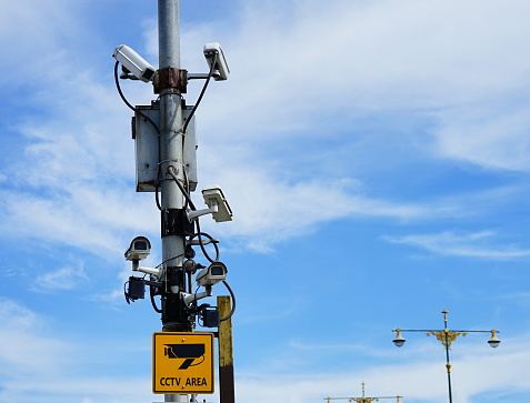 Surveillance cameras area on a pole in the city