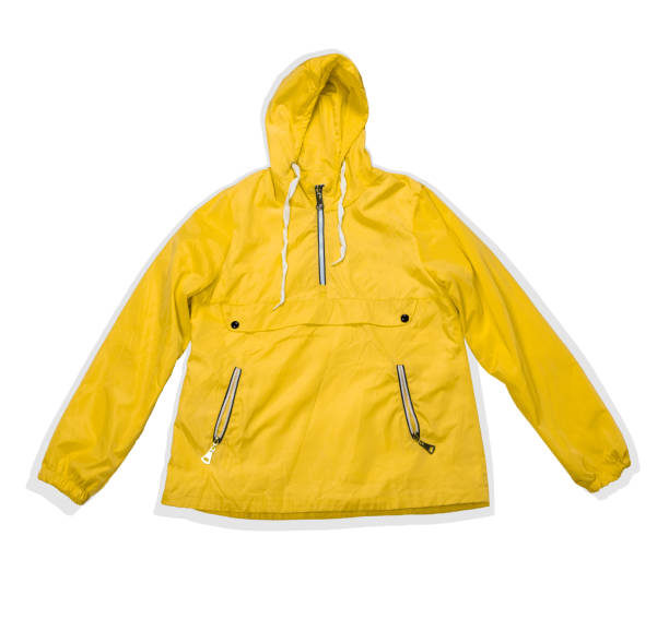 istock yellow raincoat isolated on a white background 1249585027