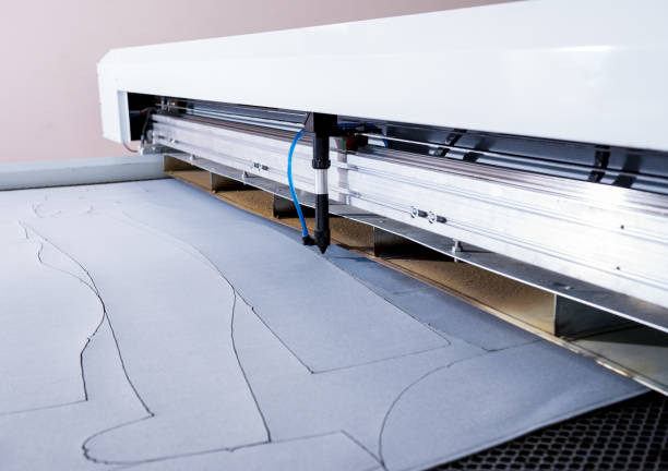 istock Fabric industry production line. Textile factory. Working tailoring process 1249586302