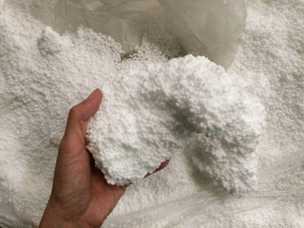 istock Urea chemical fertilizer and hand 1249586343