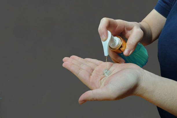 istock Women wash their hands with alcohol gel or sanitizing soap. 1249586531