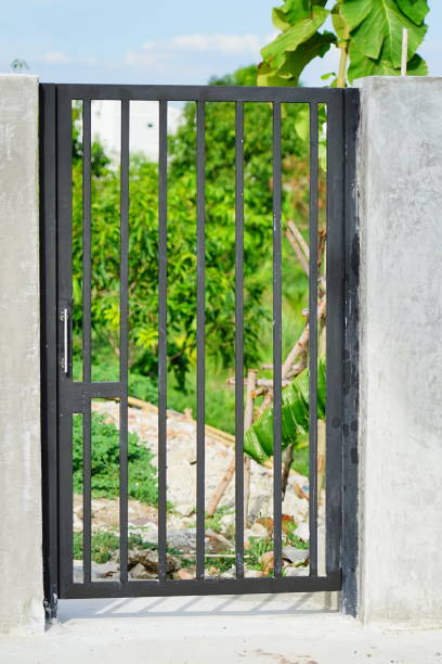 istock Chrome fence gate outdoor. 1249588227