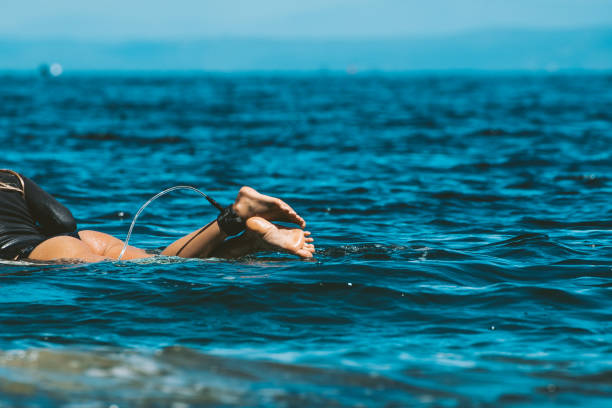 istock Girl on the surfboard 1249589043