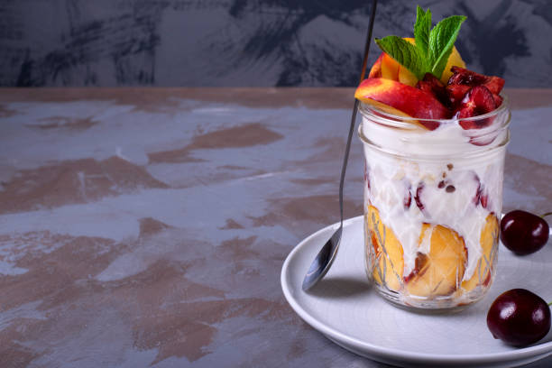 istock Overnight oats with nectarine, cherry, yogurt and milk 1249589089