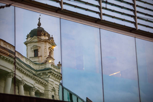 istock reflection of old building in glass window 1249594676