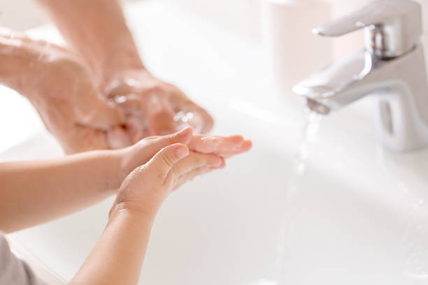 istock Washing hands rubbing with soap for corona virus prevention 1249596123