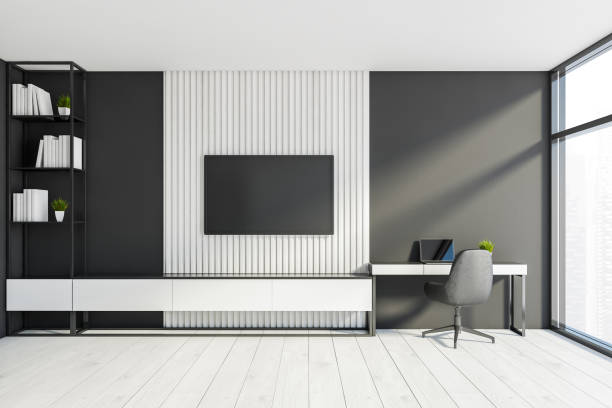 istock White and gray home office interior with TV 1249596970